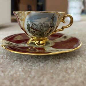 Elegant Red and Gold Teacup and Saucer